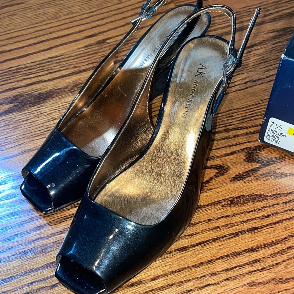Gently Used size 7.5 patent black wedges. Anne Klein